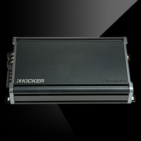 Top view of KICKER CXA1200.1 car amplifier with sleek black housing and silver accents.