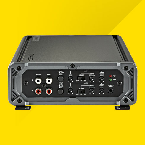 Rear view of KICKER car amplifier with RCA inputs and control panel.