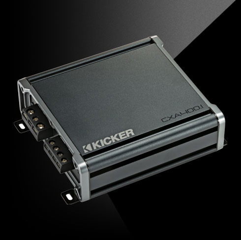 Angled top view of KICKER CXA400.1 car amplifier showing compact chassis and terminal connections.
