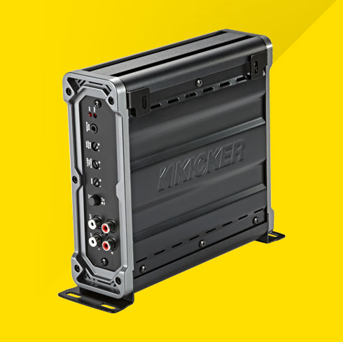 Side view of vertically mounted KICKER CXA800.1 car amplifier showing control panel and RCA inputs.