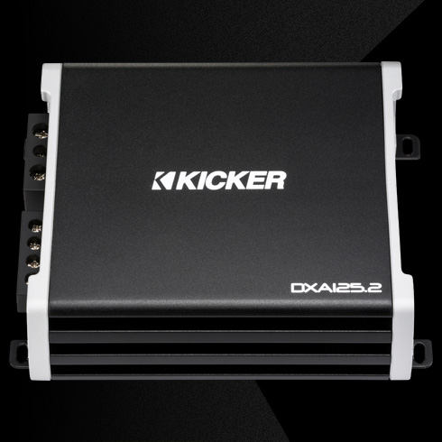 Top view of KICKER DXA125.2 amplifier with black housing, silver side panels
