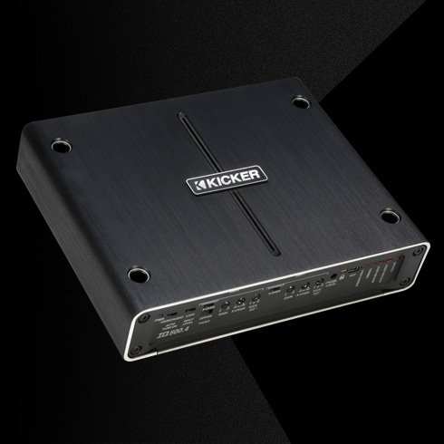 Angled top view of KICKER IQ500.4 amplifier with brushed metal finish and front control panel.