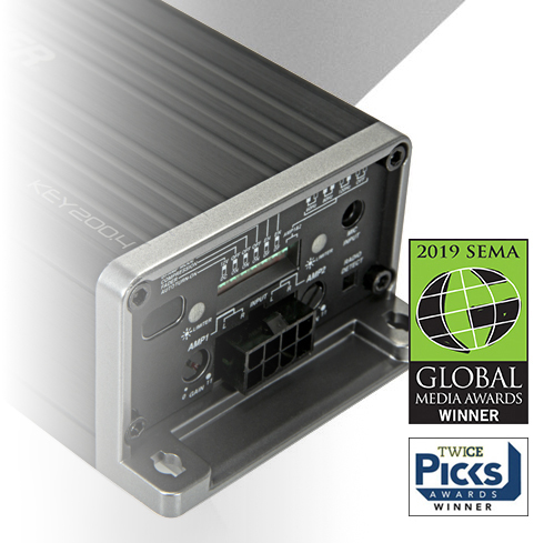 Close-up of KICKER KEY amplifier control panel, shown with 2019 SEMA Global Media Award and TWICE Picks Awards logos.