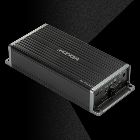 Angled view of KICKER KEY500.1 car amplifier with visible control panel.
