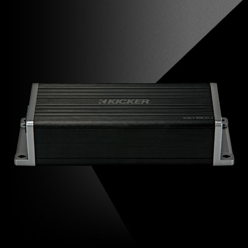 Front view of KICKER KEY2004ISO car amplifier with ribbed black casing