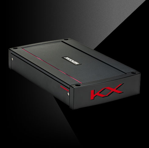 Angled view of KICKER KXA800.5 amplifier with black housing, red accent line, and side KX logo.