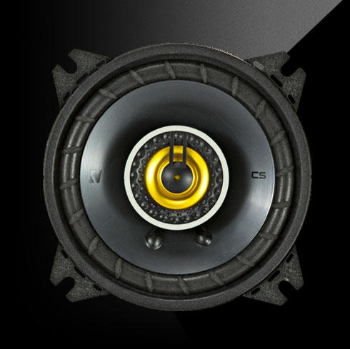 KICKER CS Series CSC4 4-inch coaxial car speaker with yellow accent.