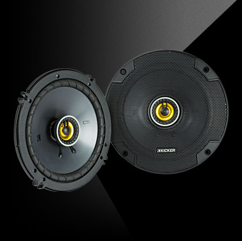 Pair of KICKER CS Series CSC6 6.5-inch coaxial car speakers with black cones and yellow highlights.