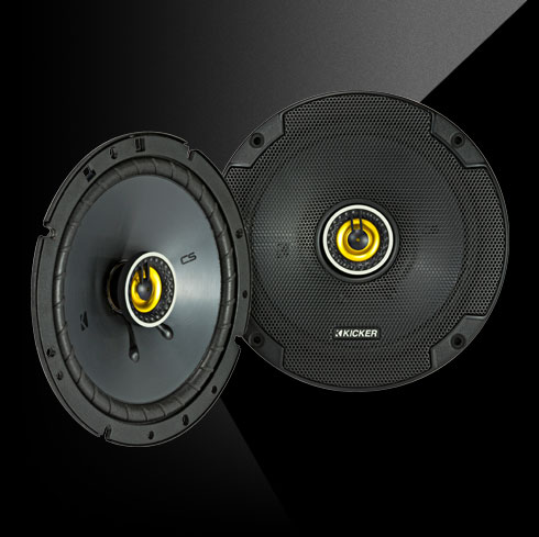 Pair of KICKER CS Series CSC7 6.75-inch coaxial car speakers with black cones and yellow highlights.