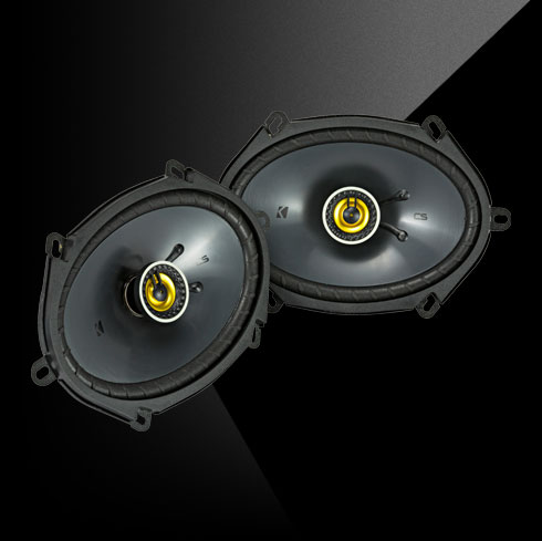Pair of KICKER CS Series CSC68 6x8-inch coaxial car speakers with black cones and yellow highlights.