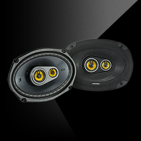 Pair of KICKER CS Series CSC693 6x9-inch coaxial car speakers with black cones and yellow highlights.