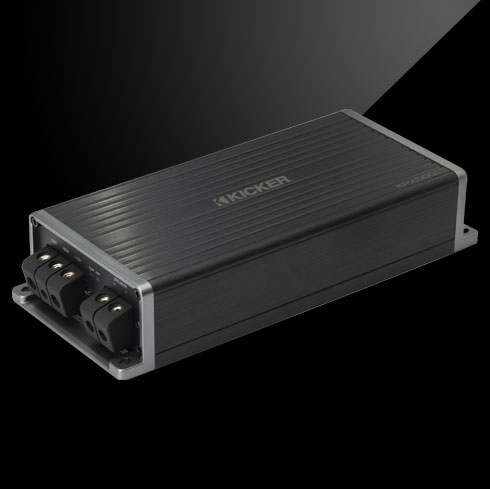 Angled view of KICKER KPX amplifier with ribbed black casing and side power terminals