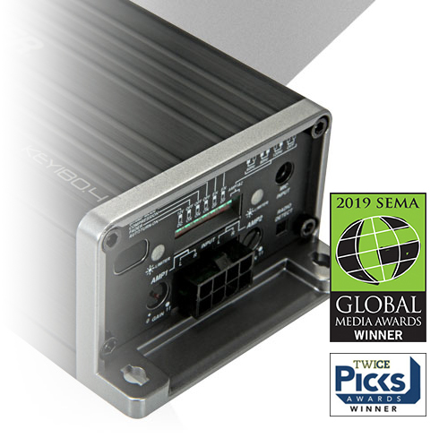 Close-up of KICKER KEY amplifier control panel, shown with 2019 SEMA Global Media Award and TWICE Picks Awards logos.