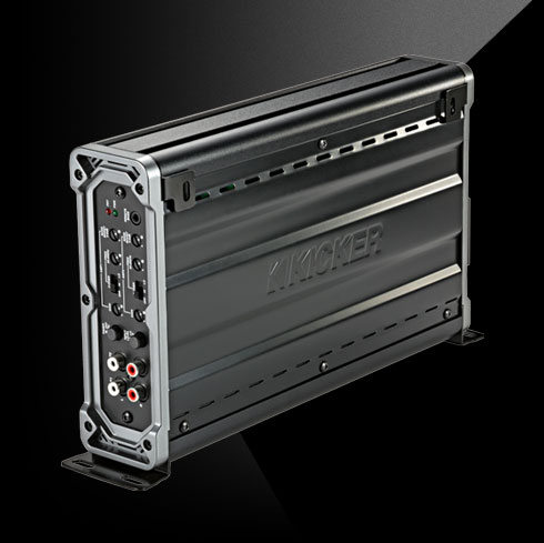 Side view of KICKER car amplifier in vertical mount position, showing inputs and controls.