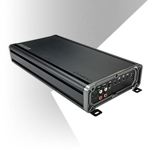 Angled view of KICKER CXA1800.4 car amplifier showing control panel with RCA inputs and tuning dials