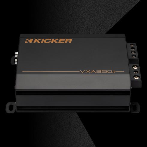 Rear view of a VXA KICKER car amplifier showing RCA inputs, tuning controls, and power indicators.