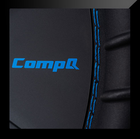 Close-up of blue CompQ logo on the subwoofer cone.